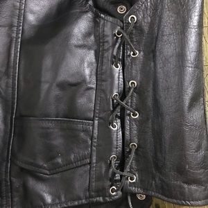 Adjustable leather vest